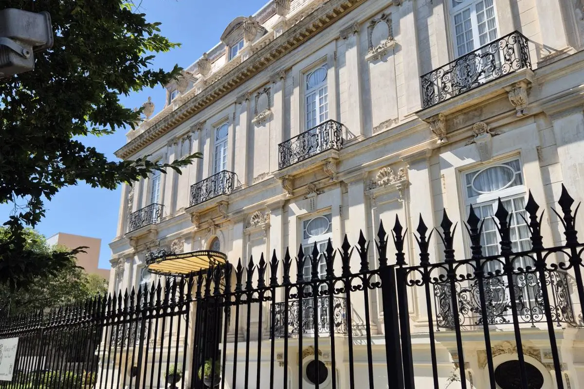 A French-style mansion with wrought-iron balconies and railings on Paseo de Montejo in Mérida