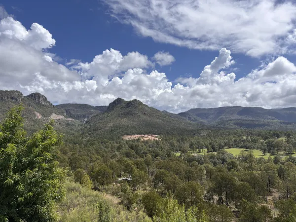Forested mountains under a cloudy sky in Mexico